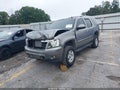 2007 Chevrolet Tahoe — photo 2 of 16 | VIN 1GNFC13JX7R117917