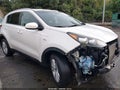 2018 Kia Sportage — photo 14 of 17 | VIN KNDPMCAC2J7394431