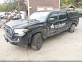 2020 Toyota Tacoma — photo 2 of 16 | VIN 3TMDZ5BNXLM083662
