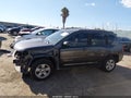 2016 Jeep Compass — photo 14 of 16 | VIN 1C4NJCEA6GD742332