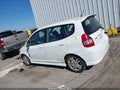 2007 Honda Fit — photo 14 of 17 | VIN JHMGD38687S052129