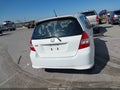 2007 Honda Fit — photo 16 of 17 | VIN JHMGD38687S052129