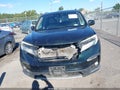 2019 Honda Pilot — photo 12 of 16 | VIN 5FNYF6H02KB035412