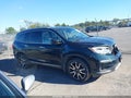 2019 Honda Pilot — photo 13 of 16 | VIN 5FNYF6H02KB035412