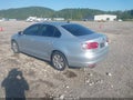 2014 Volkswagen Jetta — photo 3 of 11 | VIN 3VWD07AJ0EM417265