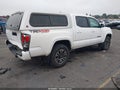 2021 Toyota Tacoma — photo 4 of 16 | VIN 3TMCZ5AN0MM373987