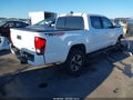 2018 Toyota Tacoma — photo 4 of 19 | VIN 3TMCZ5ANXJM157463
