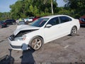 2012 Volkswagen Passat — photo 2 of 16 | VIN 1VWBH7A35CC084948