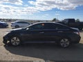 2013 Hyundai Sonata Hybrid — photo 14 of 16 | VIN KMHEC4A43DA081027