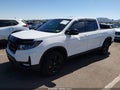 2026 Honda Ridgeline — photo 2 of 16 | VIN 5FPYK3F82TB019593