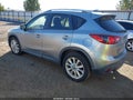 2014 Mazda CX-5 — photo 3 of 17 | VIN JM3KE4DY9E0390547