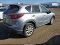 2014 Mazda CX-5 — photo 4 of 17 | VIN JM3KE4DY9E0390547