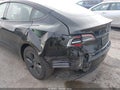 2023 Tesla Model 3 — photo 6 of 18 | VIN 5YJ3E1EB0PF694599