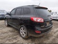 2012 Hyundai Santa Fe — photo 3 of 11 | VIN 5XYZK4AGXCG162138