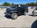 2014 Jeep Wrangler — photo 2 of 16 | VIN 1C4AJWAG2EL192690