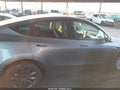 2025 Tesla Model Y — photo 13 of 19 | VIN 7SAYGDEE1SF288161