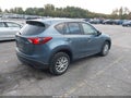 2014 Mazda CX-5 — photo 4 of 16 | VIN JM3KE2CY6E0412204