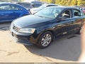 2015 Volkswagen Jetta — photo 2 of 11 | VIN 3VWD17AJ8FM333466