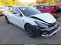 2023 Tesla Model 3 — photo 10 of 16 | VIN 5YJ3E1EA4PF385418