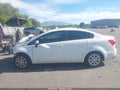 2015 Kia Rio — photo 13 of 15 | VIN KNADM4A30F6502192
