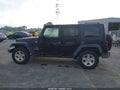 2010 Jeep Wrangler Unlimited — photo 14 of 16 | VIN 1J4BA3H18AL184943