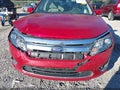 2012 Ford Fusion — photo 14 of 16 | VIN 3FADP0L36CR175155