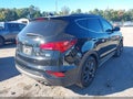 2017 Hyundai Santa Fe — photo 4 of 16 | VIN 5XYZW4LA2HG486060