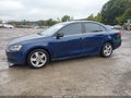 2014 Volkswagen Jetta — photo 2 of 19 | VIN 3VW3L7AJXEM384472