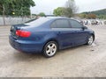 2014 Volkswagen Jetta — photo 4 of 19 | VIN 3VW3L7AJXEM384472