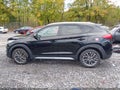 2021 Hyundai Tucson — photo 14 of 16 | VIN KM8J3CALXMU372235