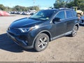 2018 Toyota RAV4 — photo 2 of 12 | VIN 2T3RFREV6JW824497