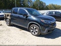 2019 Honda Ridgeline — photo 1 of 18 | VIN 5FPYK3F6XKB005325