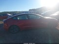 2021 Tesla Model 3 — photo 13 of 16 | VIN 5YJ3E1EAXMF099701