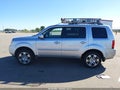2011 Honda Pilot — photo 14 of 16 | VIN 5FNYF4H57BB032733