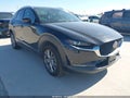 2023 Mazda CX-30 — photo 1 of 16 | VIN 3MVDMBDM5PM526578
