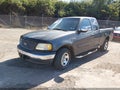 2002 Ford F-150 — photo 2 of 11 | VIN 1FTRX17282NC00761