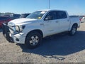 2011 Toyota Tundra — photo 2 of 19 | VIN 5TFHW5F13BX166506