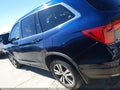 2017 Honda Pilot — photo 14 of 16 | VIN 5FNYF5H52HB029124