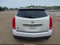 2016 Cadillac SRX — photo 16 of 16 | VIN 3GYFNBE39GS582221
