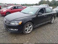 2013 Volkswagen Passat — photo 2 of 11 | VIN 1VWCN7A3XDC012478