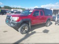 2015 Toyota Tacoma — photo 2 of 16 | VIN 5TFUX4ENXFX031362