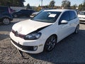 2014 Volkswagen GTI — photo 2 of 18 | VIN WVWHD7AJ7EW000282