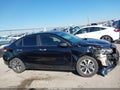 2022 Kia Rio — photo 13 of 16 | VIN 3KPA24AD2NE442512