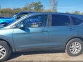 2015 Honda CR-V — photo 15 of 17 | VIN 5J6RM4H50FL012153