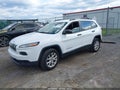 2016 Jeep Cherokee — photo 2 of 16 | VIN 1C4PJMABXGW280097