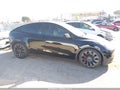 2023 Tesla Model Y — photo 14 of 19 | VIN 7SAYGDEF3PF708972