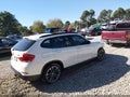 2014 BMW X1 — photo 4 of 16 | VIN WBAVM1C54EVW52425