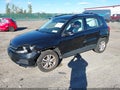 2017 Volkswagen Tiguan — photo 2 of 16 | VIN WVGBV7AX6HK029531