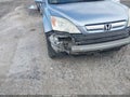 2007 Honda CR-V — photo 6 of 13 | VIN 5J6RE48707L001024