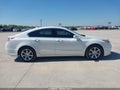 2013 Acura TL — photo 13 of 16 | VIN 19UUA8F52DA001829